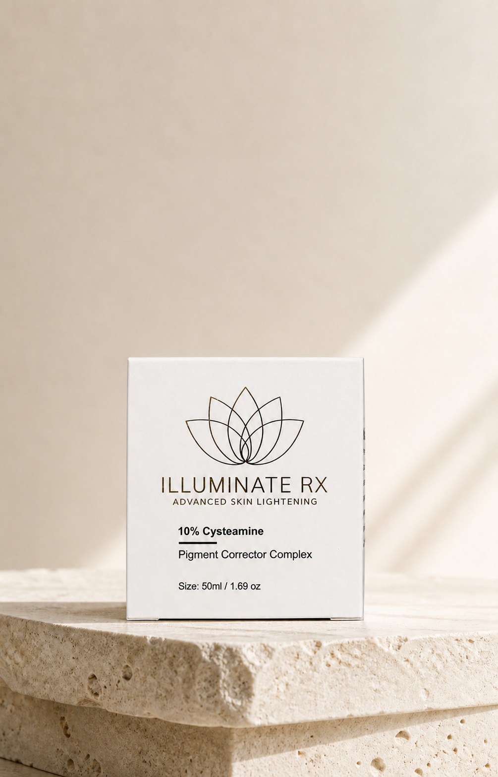 Illuminate Rx 10% Cysteamine Pigment Corrector Complex carton on a stone slab.